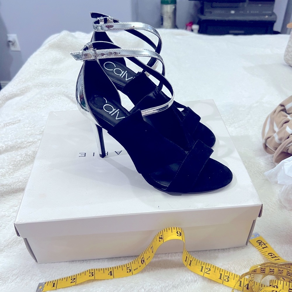 Calvin Klein Nevah Black and Silver heels & ankle strap silhouette size 7.5